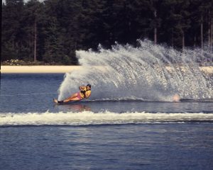 Waterskiing is a popular activity at Lake Lanier, and it has a long history. The first waterskiers on the lake were likely locals who took to the water in the early 1950s, shortly after the lake was created. In the early days, waterskiing was a relatively new sport, and equipment was not as specialized as it is today. Waterskiers often used homemade skis and tow ropes, and they had to be very careful to avoid obstacles in the water.

As the sport of waterskiing grew in popularity, more and more people began to visit Lake Lanier to ski. In the 1960s, several waterskiing clubs were formed on the lake, and these clubs helped to promote the sport and to provide a safe environment for waterskiers.

In the 1970s, waterskiing competitions began to be held on Lake Lanier. These competitions attracted waterskiers from all over the country, and they helped to put Lake Lanier on the map as a premier waterskiing destination.

Today, waterskiing is still a popular activity on Lake Lanier. There are several waterskiing clubs on the lake, and they offer a variety of programs for both beginners and experienced waterskiers. There are also several waterskiing competitions held on the lake each year.

If you are interested in waterskiing, Lake Lanier is a great place to learn or to improve your skills. The lake is large and has plenty of room for waterskiing, and there are several waterskiing clubs and schools that can provide instruction and equipment.