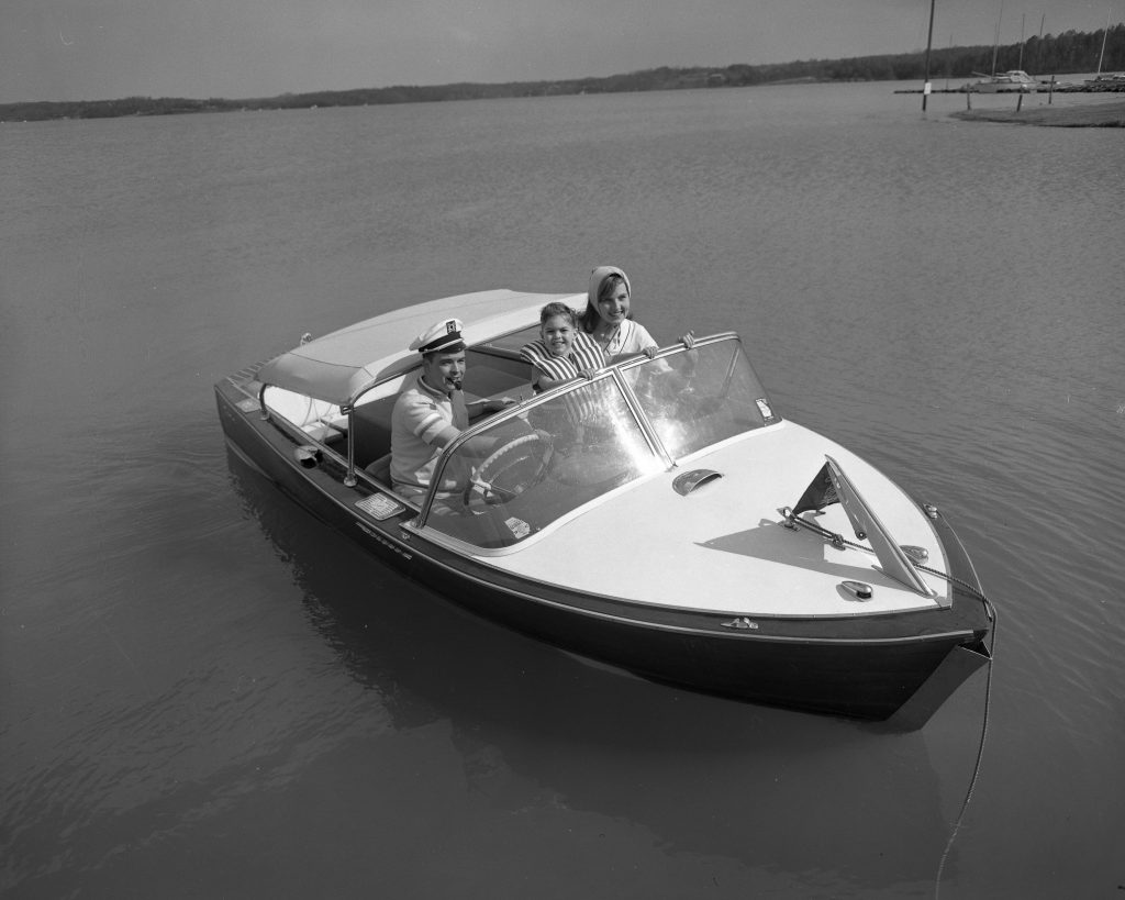 In the 1950s, boating was a popular activity for families to enjoy on Lake Sidney Lanier. Families would often pack a lunch and spend the day on the lake, swimming, fishing, and exploring the many coves and inlets.

Lake Sidney Lanier was created in 1956 when the Buford Dam was built on the Chattahoochee River. The lake is located in the foothills of the Blue Ridge Mountains, and its scenic beauty makes it a popular tourist destination.

In the 1950s, there were many different types of boats available for families to rent or buy. Some of the most popular types of boats included pontoon boats, fishing boats, and speedboats.

Pontoon boats were perfect for families with young children. They were stable and easy to maneuver, and they had plenty of room for swimming and playing. Fishing boats were popular with families who enjoyed fishing. They were equipped with rod holders and live wells, and they had plenty of storage space for fishing gear. Speedboats were popular with families who enjoyed water sports. They were fast and agile, and they were perfect for water skiing, wakeboarding, and tubing.

No matter what type of boat they chose, families enjoyed spending time on Lake Sidney Lanier. The lake offered a variety of activities for all ages, and it was a beautiful place to relax and enjoy the outdoors.

Here are some specific examples of boating family day trips at Lake Sidney Lanier in the 1950s:

In 1952, the Jones family spent a day on Lake Sidney Lanier. They rented a pontoon boat and spent the day swimming, fishing, and exploring the lake.
In 1954, the Smith family went on a boat ride on Lake Sidney Lanier. They rented a fishing boat and caught many different kinds of fish.
In 1956, the Brown family went camping at Lake Sidney Lanier. They rented a speedboat and spent the day water skiing and wakeboarding.
Lake Sidney Lanier was a popular destination for families in the 1950s. It offered a variety of activities for all ages, and it was a beautiful place to relax and enjoy the outdoors.